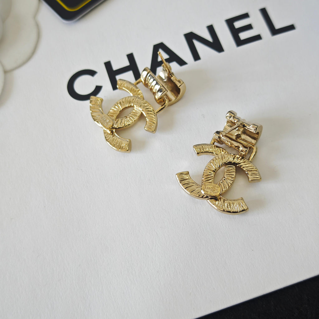Intricately Carved Spring Letter Earrings