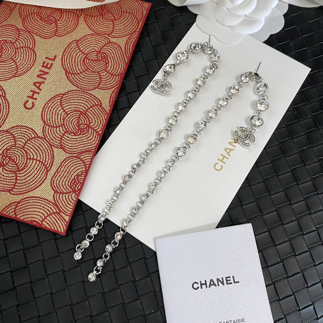Silver round diamond long earrings