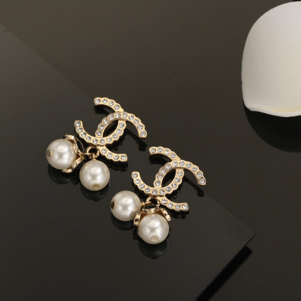 Gold diamond pearl stud earrings