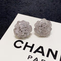 Silver camellia stud earrings with full diamonds