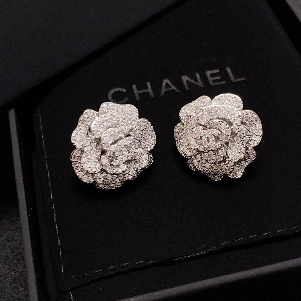 Silver camellia stud earrings with full diamonds