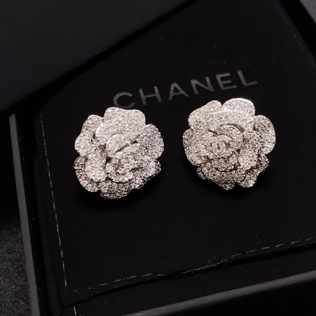 Silver camellia stud earrings with full diamonds