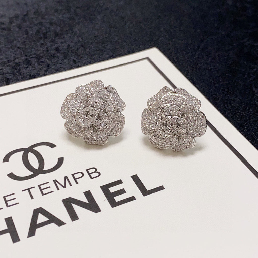 Silver camellia stud earrings with full diamonds