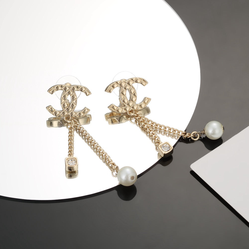 Long gold stud earrings