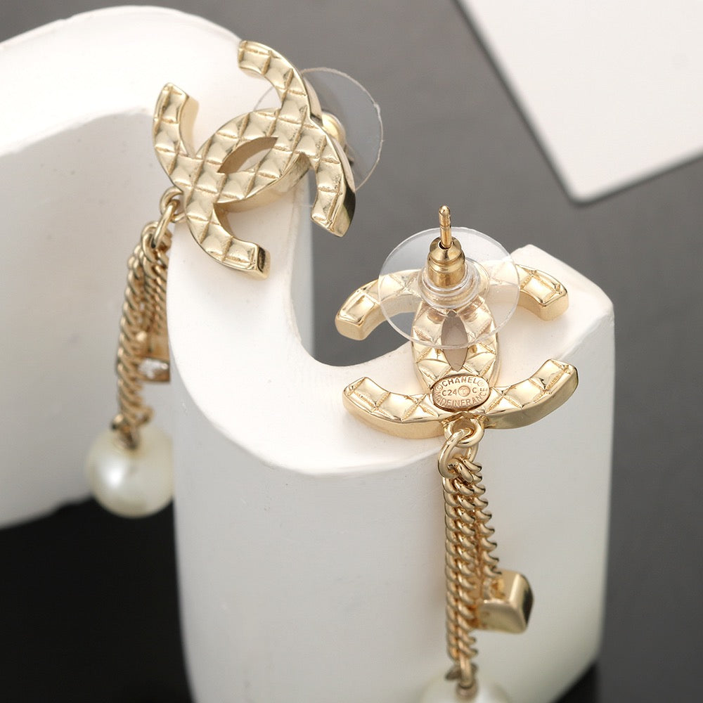 Long gold stud earrings