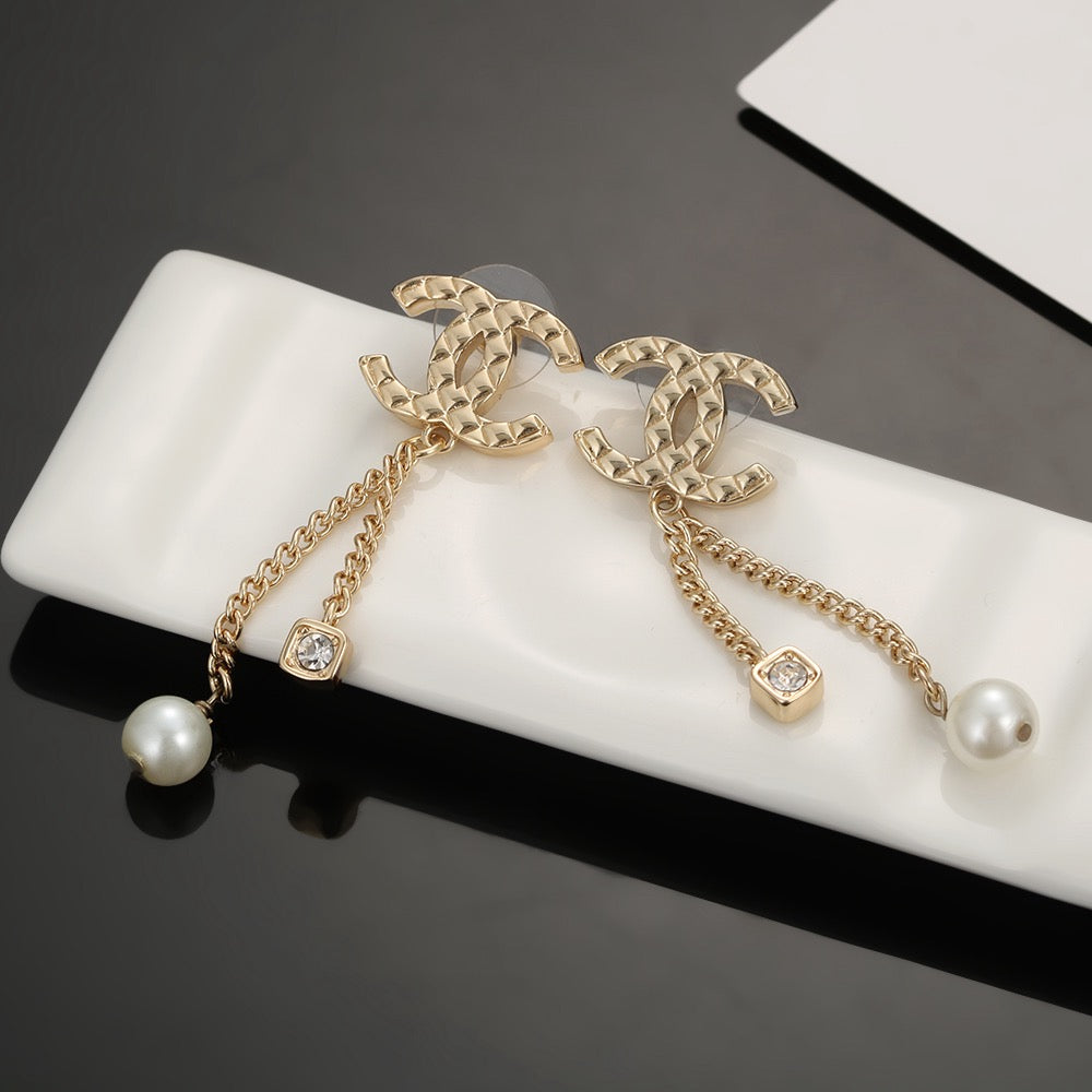 Long gold stud earrings