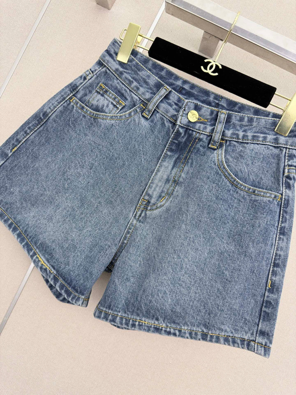 26 New style denim shorts with embroidered pockets