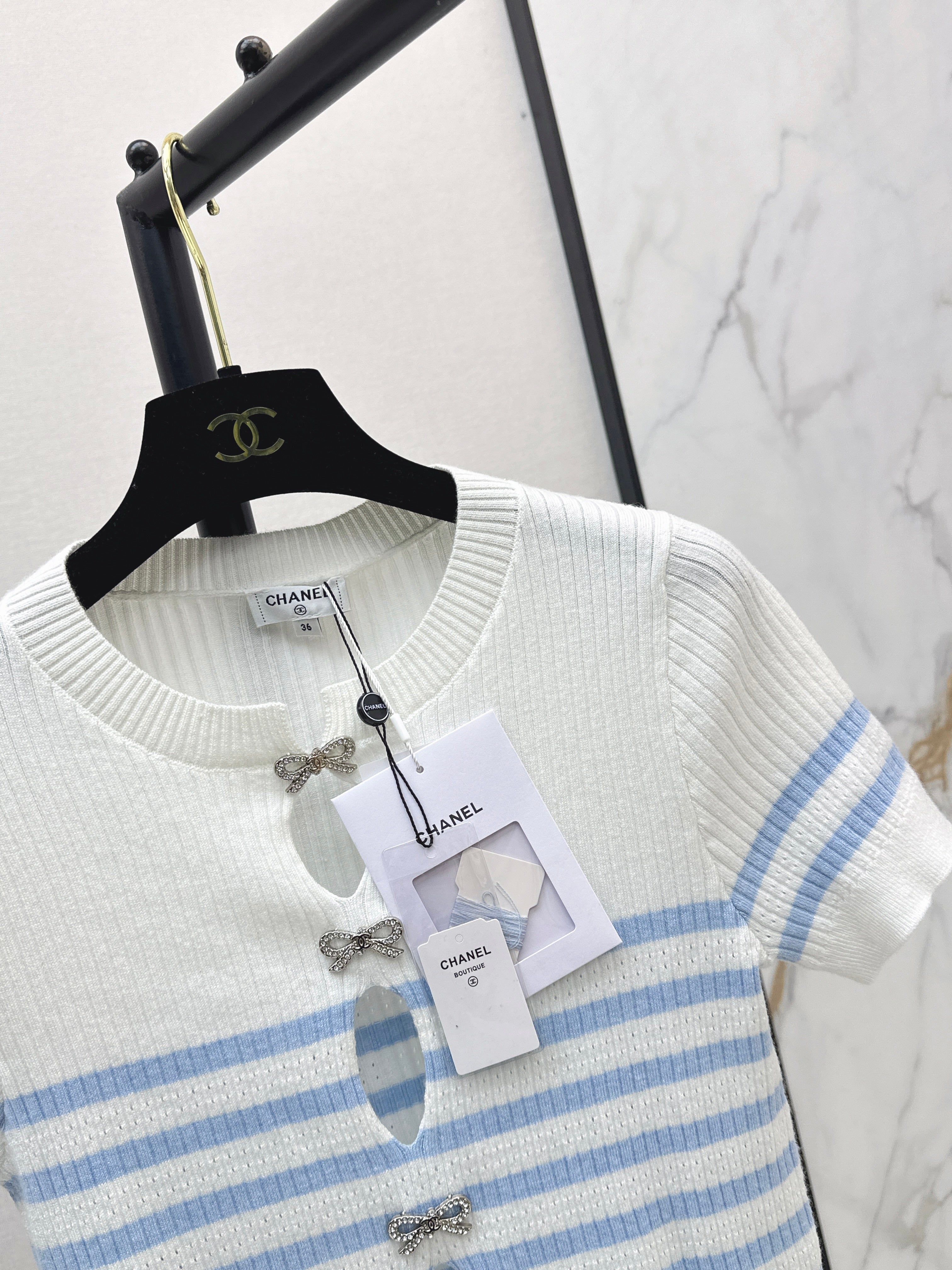 26SS - New striped knit top with bow embellishment