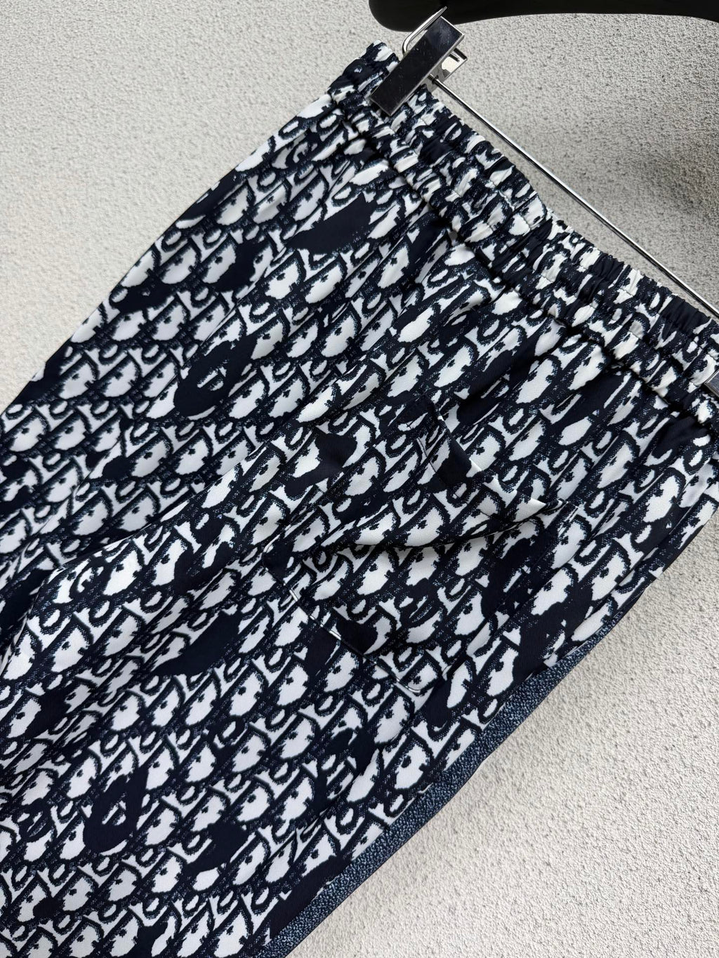 Elastic waist monogrammed trousers