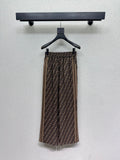 Brown elastic waist monogram trousers