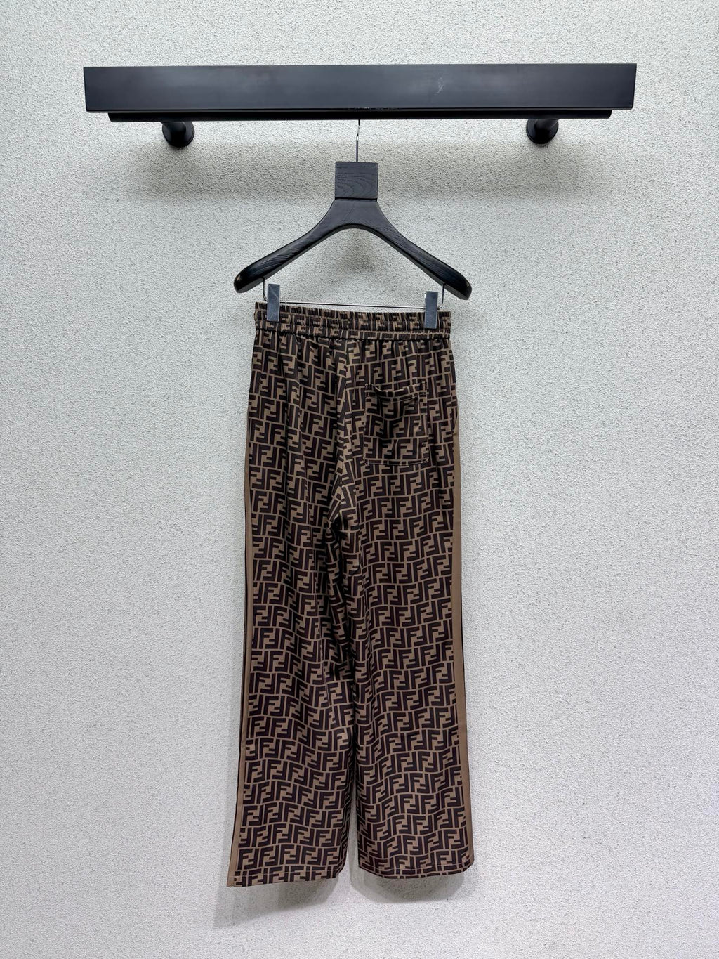 Brown elastic waist monogram trousers