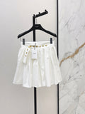26SS — New skirt with gold buckle design