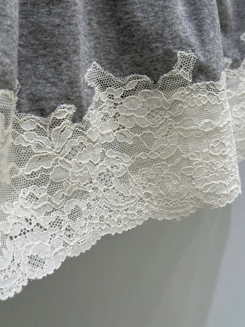 26SS — Delicate lace-trimmed top + short skirt