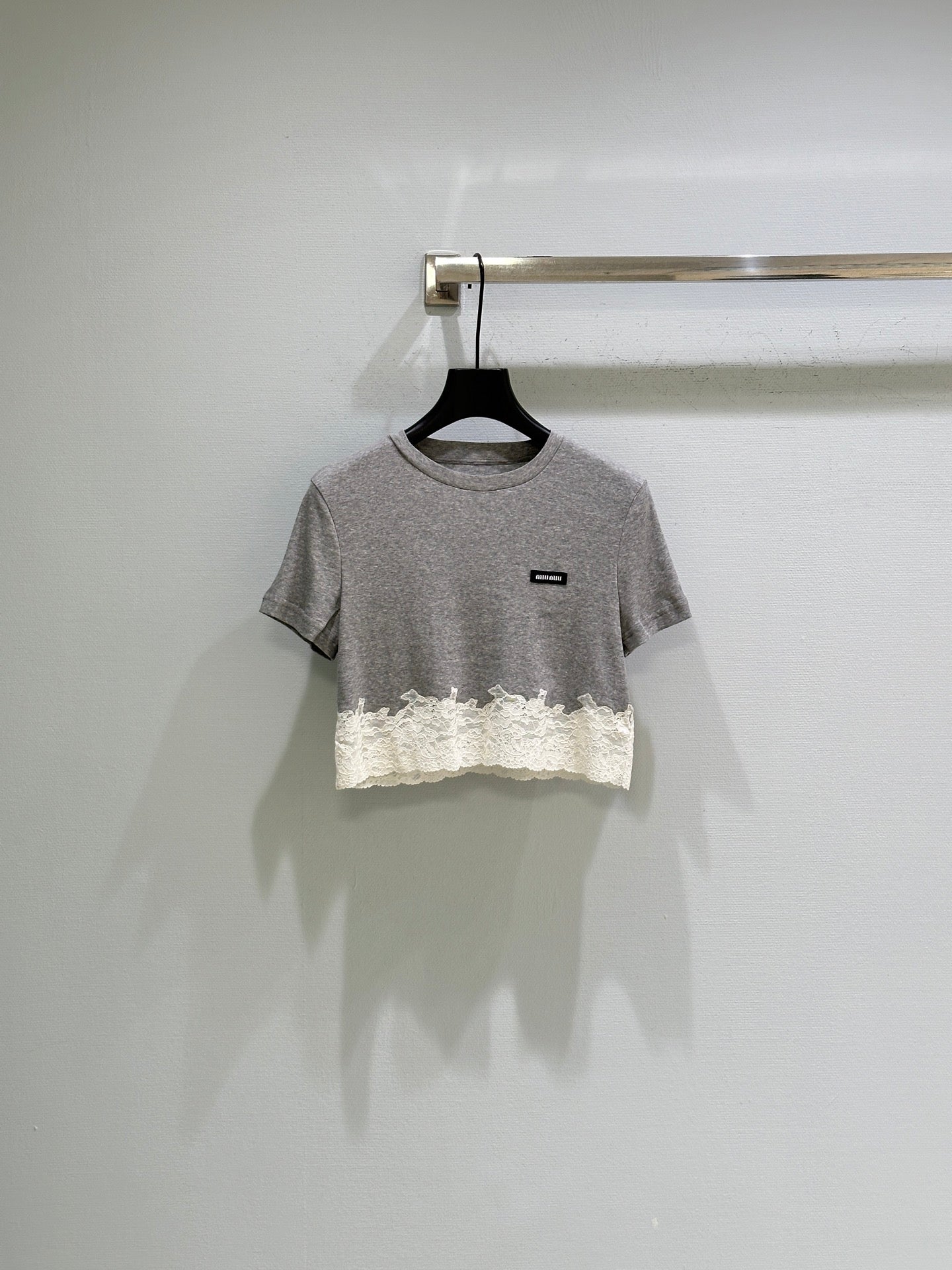 26SS — Delicate lace-trimmed top + short skirt