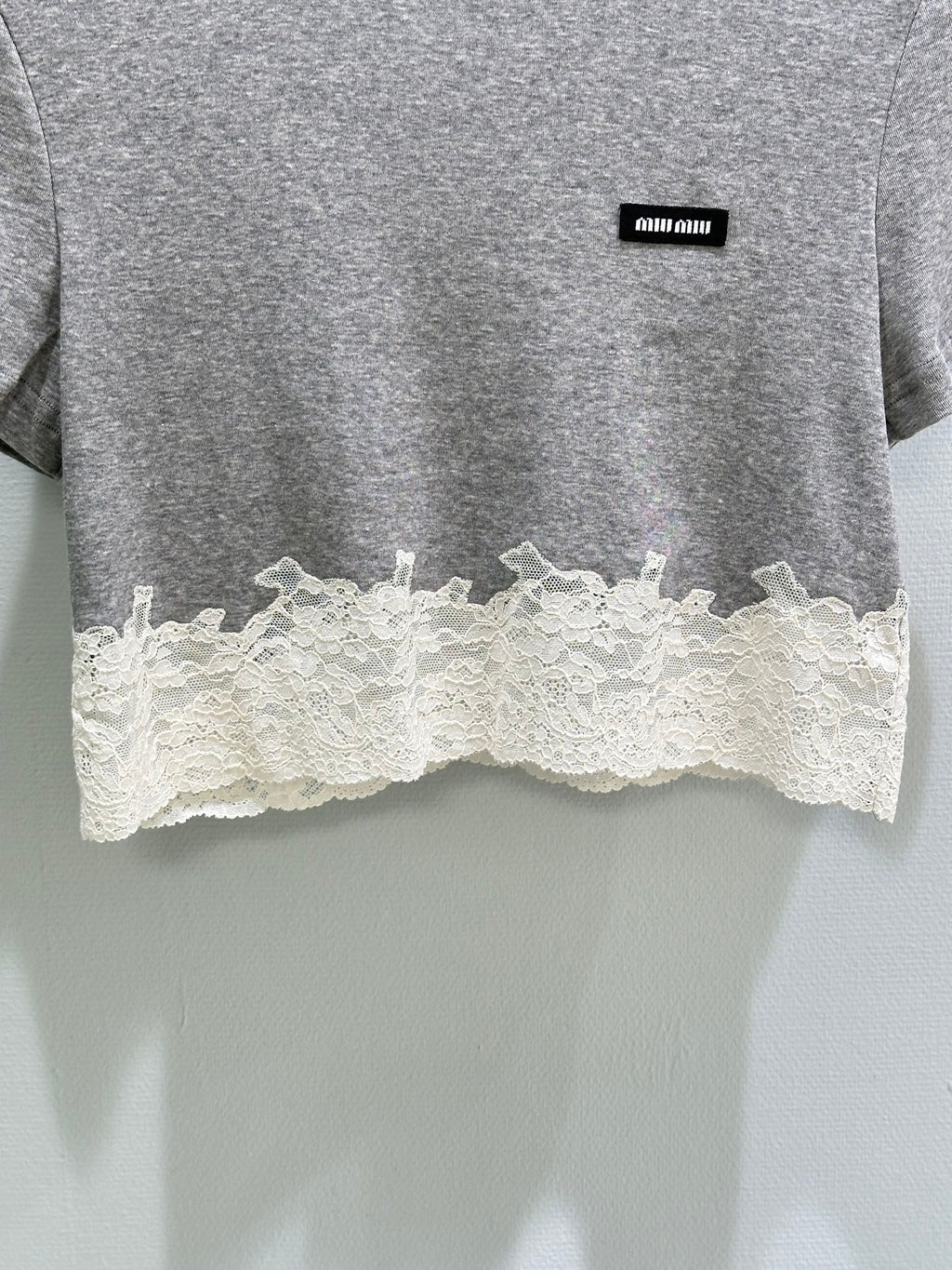 26SS — Delicate lace-trimmed top + short skirt