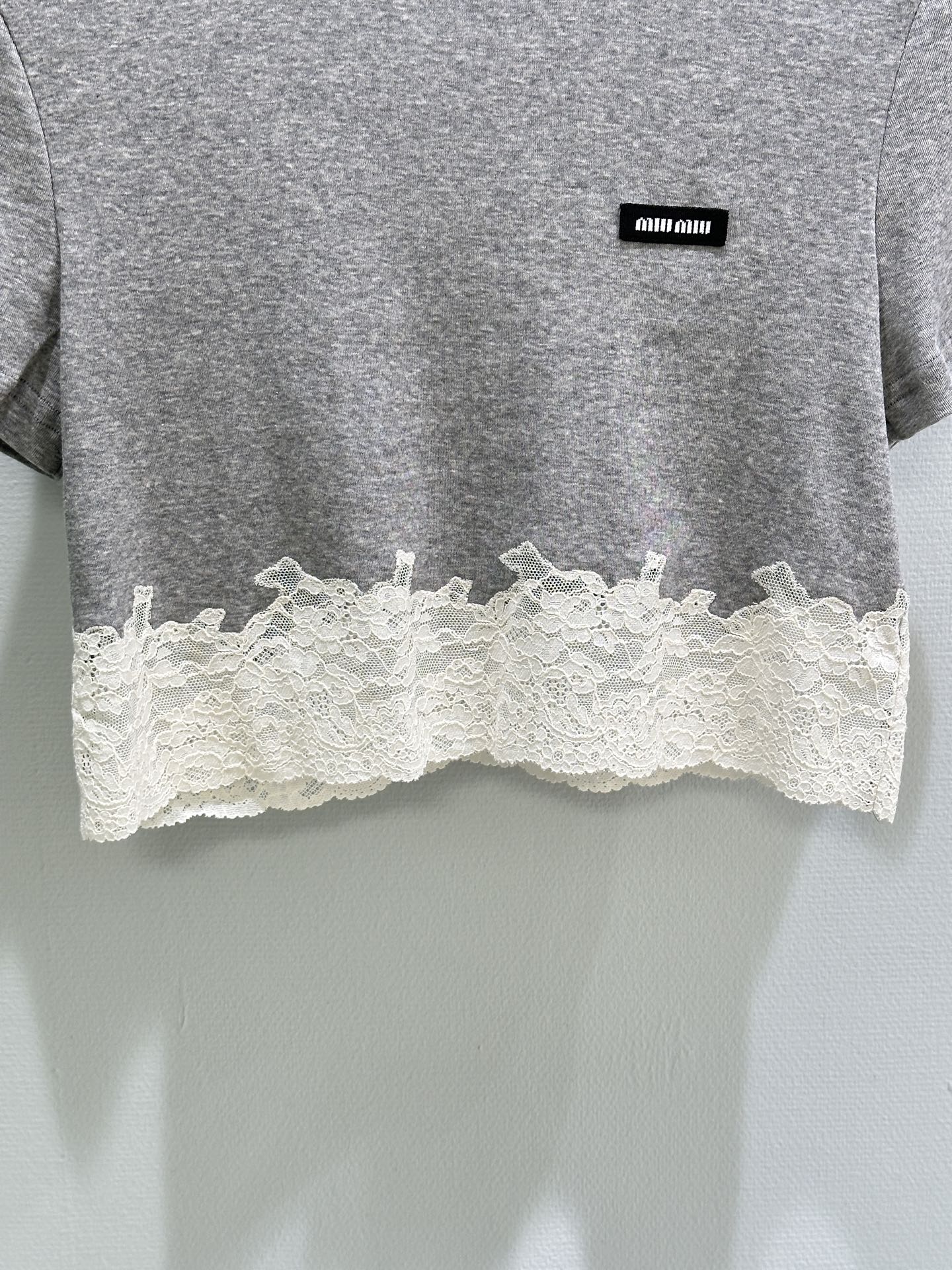 26SS — Delicate lace-trimmed top + short skirt