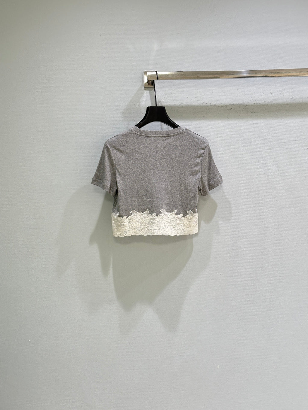 26SS — Delicate lace-trimmed top + short skirt