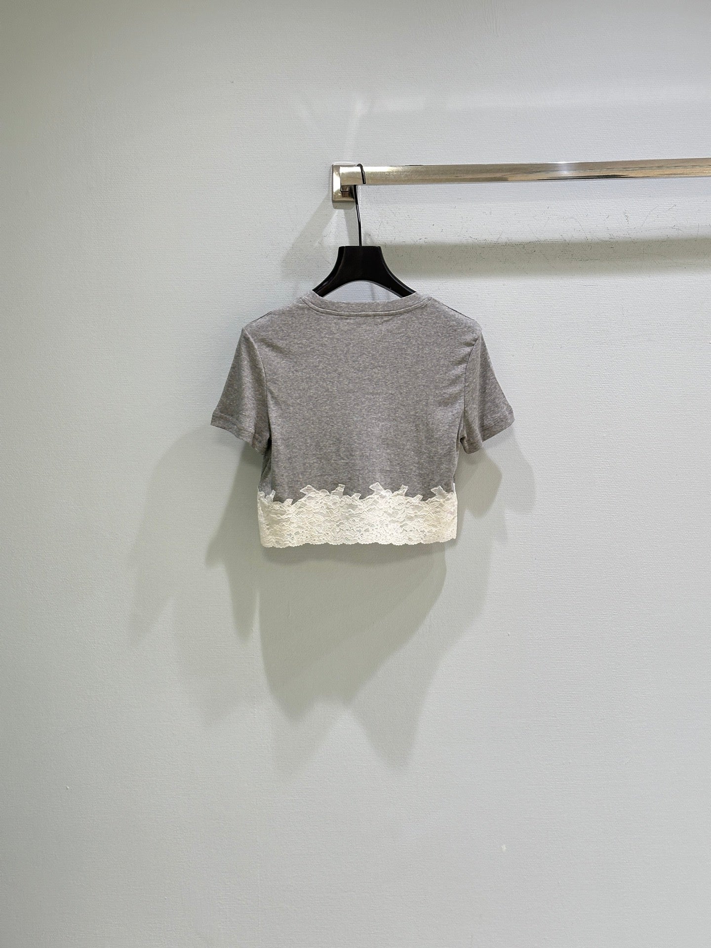 26SS — Delicate lace-trimmed top + short skirt