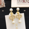Pearl tassel and diamond earrings