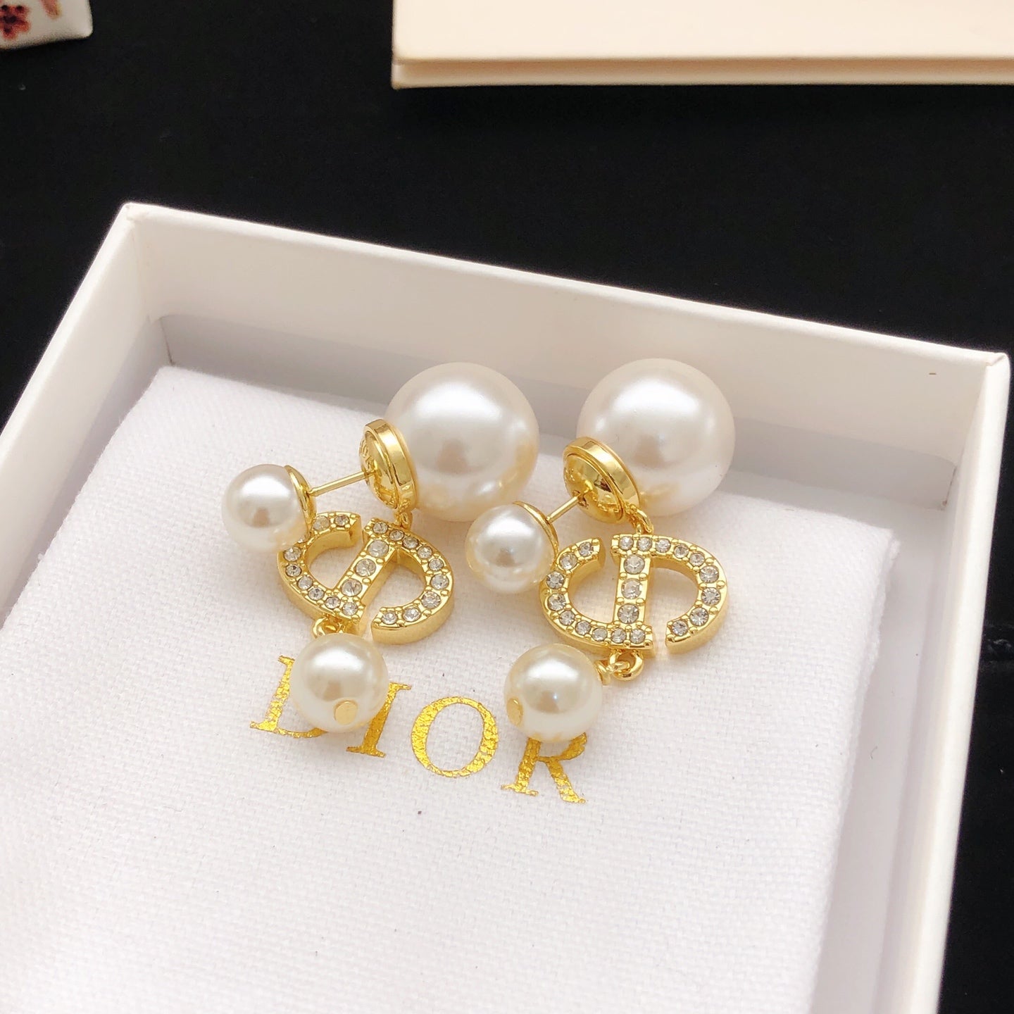 Pearl tassel and diamond earrings
