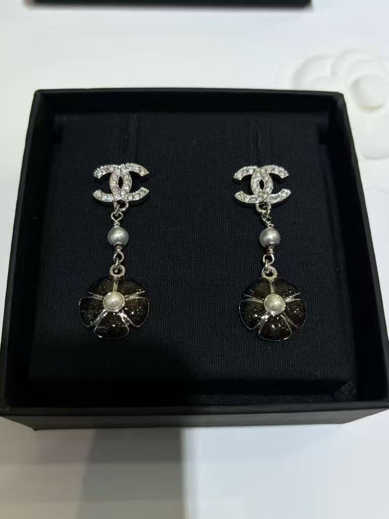 26C Early Spring Collection: Black enamel camellia flower silver stud earrings
