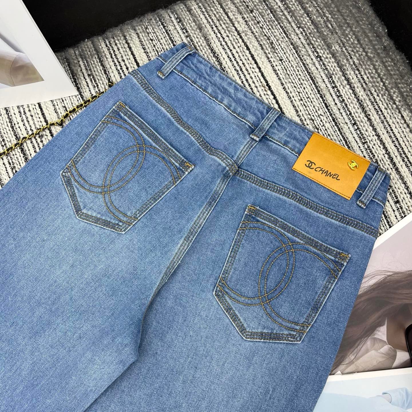Spring 2026 Early Collection: New Straight-Leg Denim Jeans featuring Beaded Pockets, Embroidered Double-C Pocket Detail, and Washed Finish