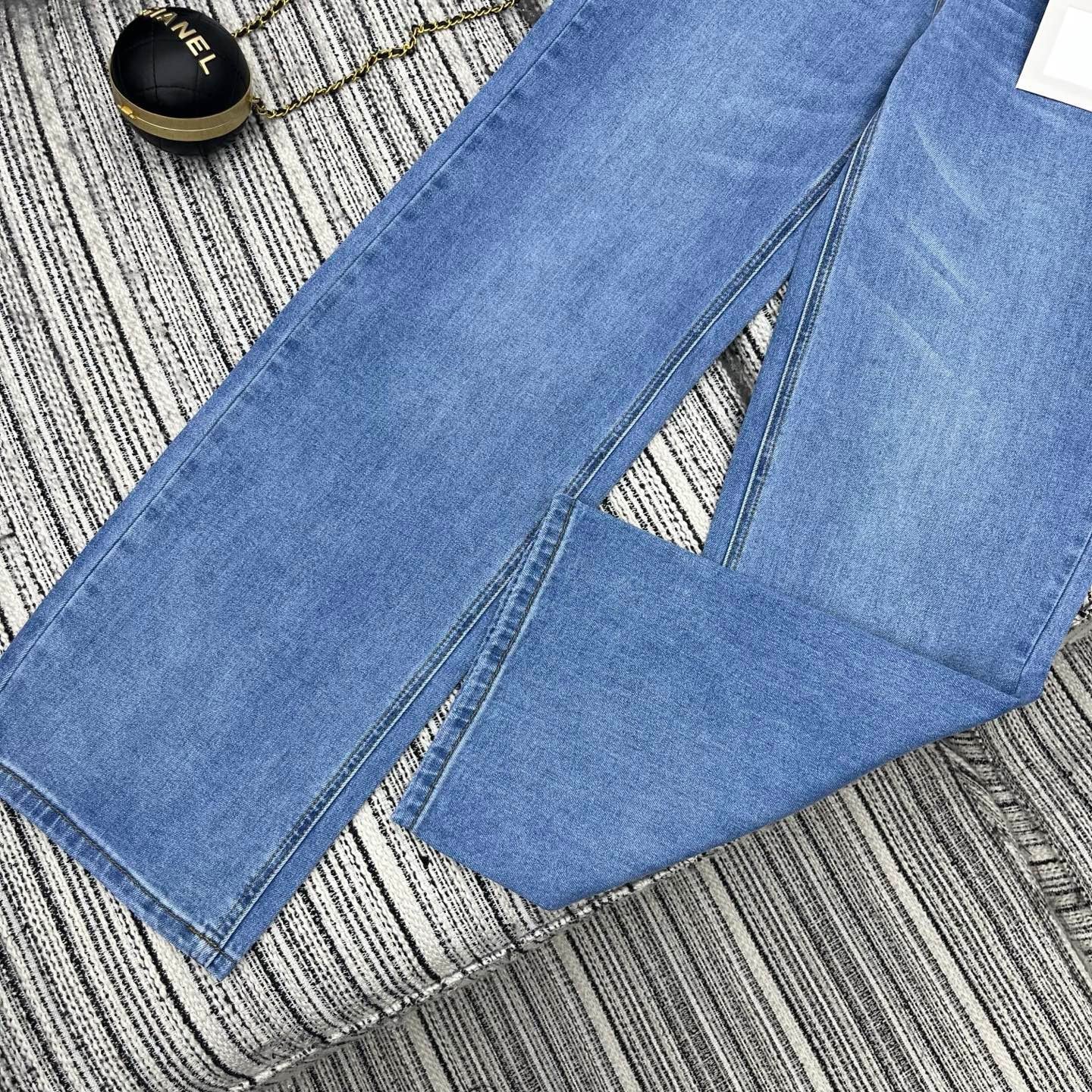 Spring 2026 Early Collection: New Straight-Leg Denim Jeans featuring Beaded Pockets, Embroidered Double-C Pocket Detail, and Washed Finish